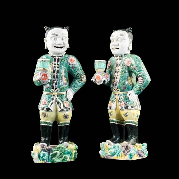Pair of Chinese export porcelain famille verte figures of boys holding sconces