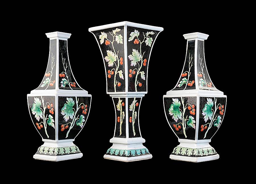 Rare Chinese porcelain garniture of Bottle Vases with black ground from the 'Pronk workshop'