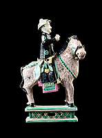 GG: Chinese biscuit porcelain model of a horse and rider