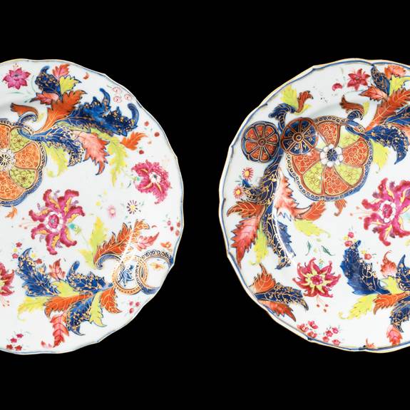 GG: Pair of Chinese export porcelain famille rose dinner plates with a pseudo tobacco leaf pattern