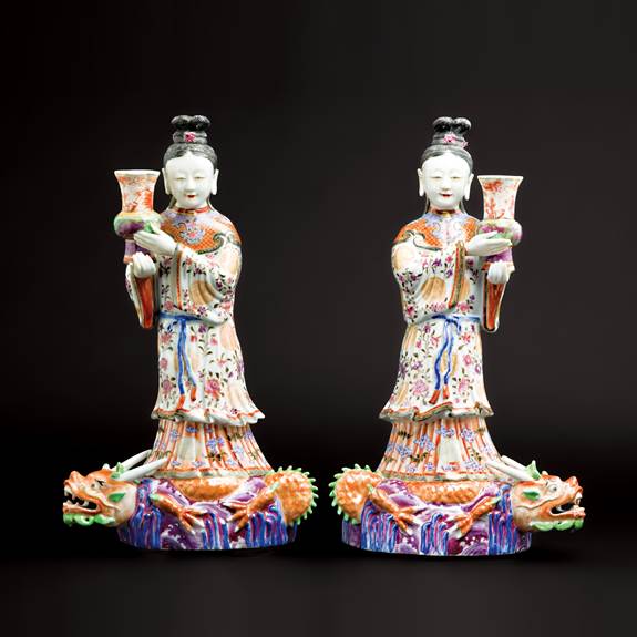 GG: Pair of Chinese porcelain maiden figures modelled as flattened wall sconces with vases