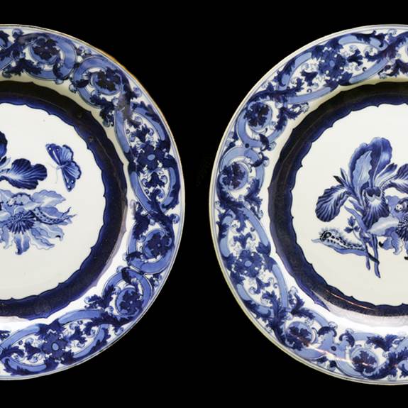Pair of Chinese export porcelain blue and white dinner plates with designs after Maria Sybille Merian