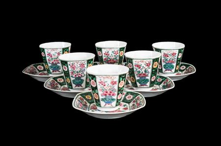 set of six Chinese porcelain famille rose black ground beakers and saucers