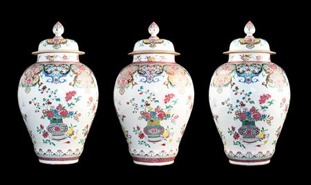 Set of three Chinese export porcelain famille rose vases & covers