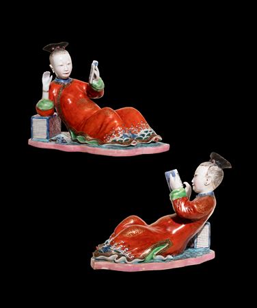 Pair of Chinese porcelain nodding figures of reclining maidens reading books